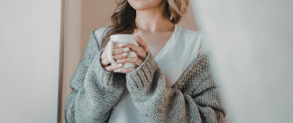 Woman holding a warm drink - therapy for women who put everyone else first